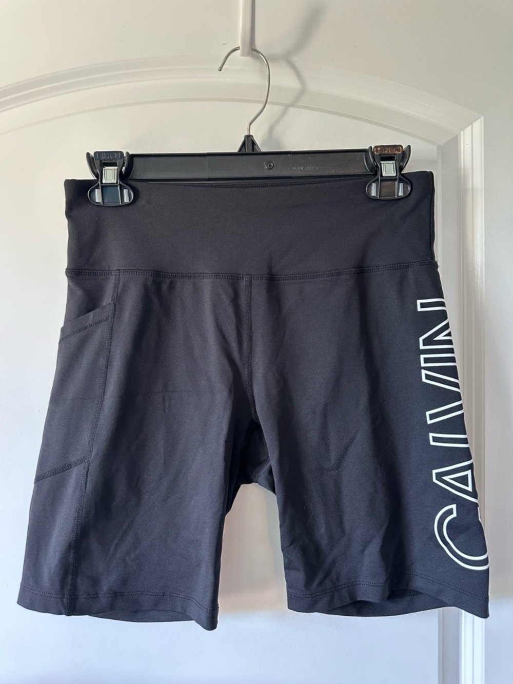 Trendy Calvin Klein Black Bike Yoga Shorts with Side Pocket and Logo Detail